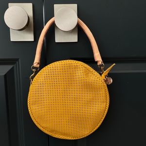 Clare V Yellow Mustard perforated circle bag purse clutch wristlet